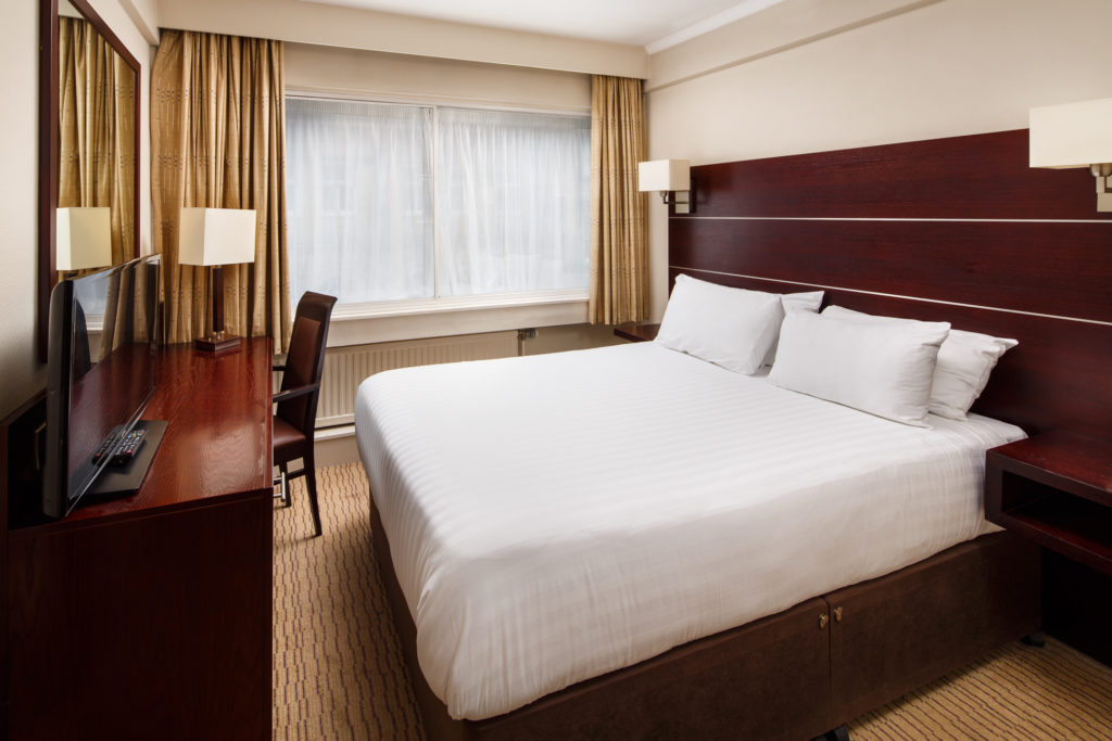Double bed in a classic bedroom at mercure manchester piccadilly hotel