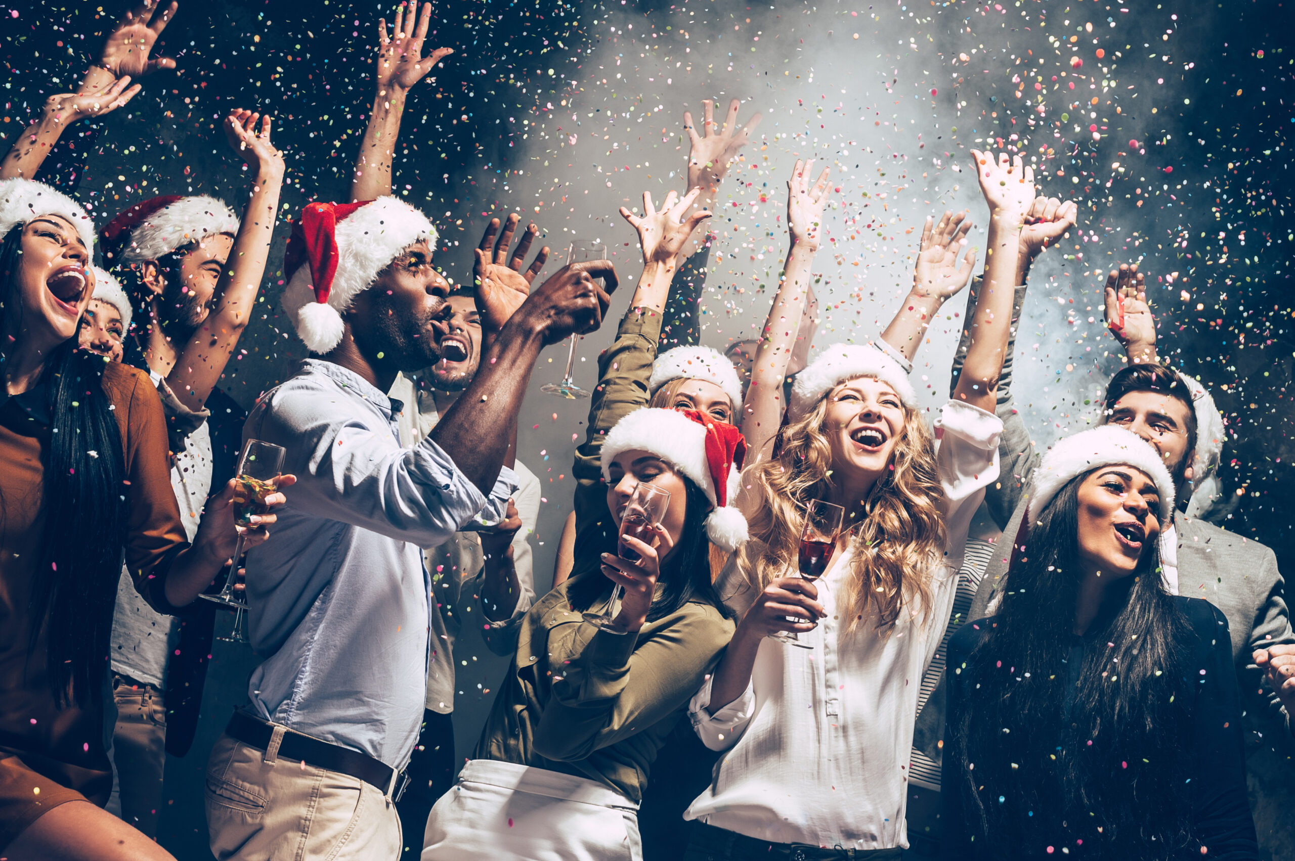 They,Love,Christmas.,Group,Of,Beautiful,Young,People,In,Santa Work colleges partying